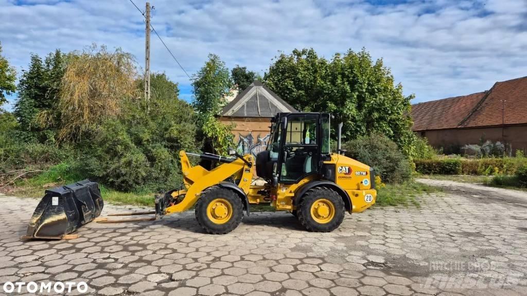 CAT 906 لوادر بعجل