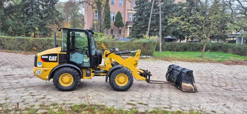 CAT 906 لوادر بعجل