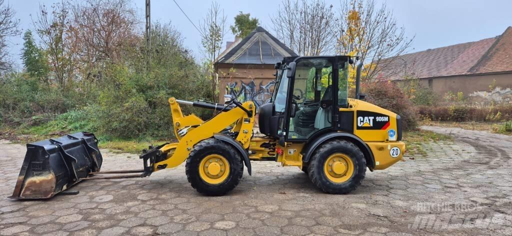 CAT 906 لوادر بعجل