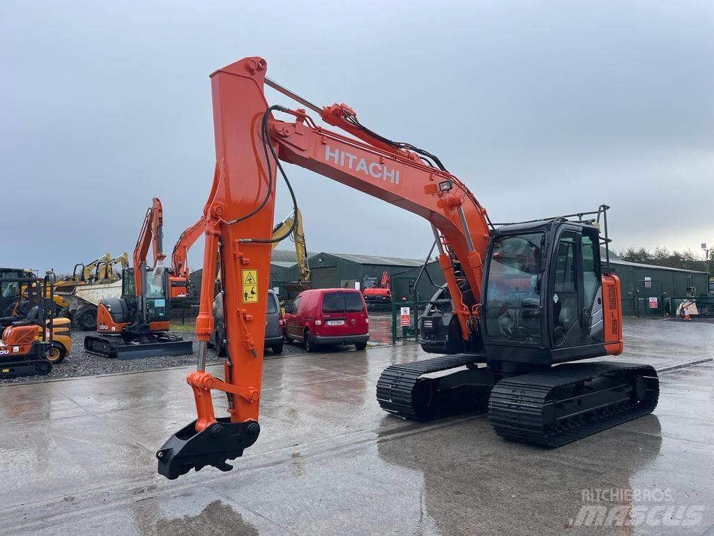 Hitachi ZX 135 US-6 حفارات زحافة