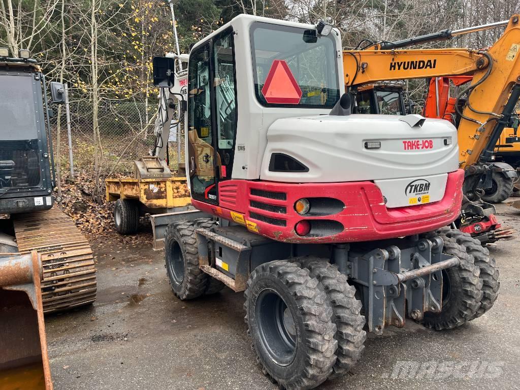 Takeuchi TB 295 W حفارات بعجل