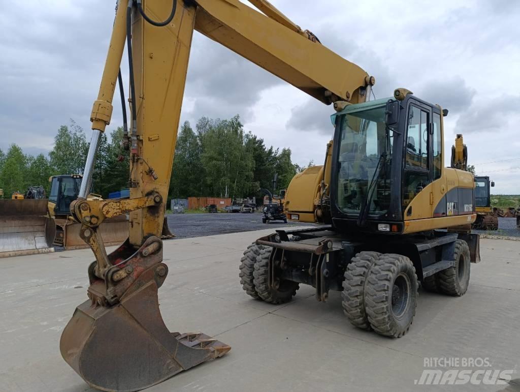 CAT M 316 C حفارات بعجل