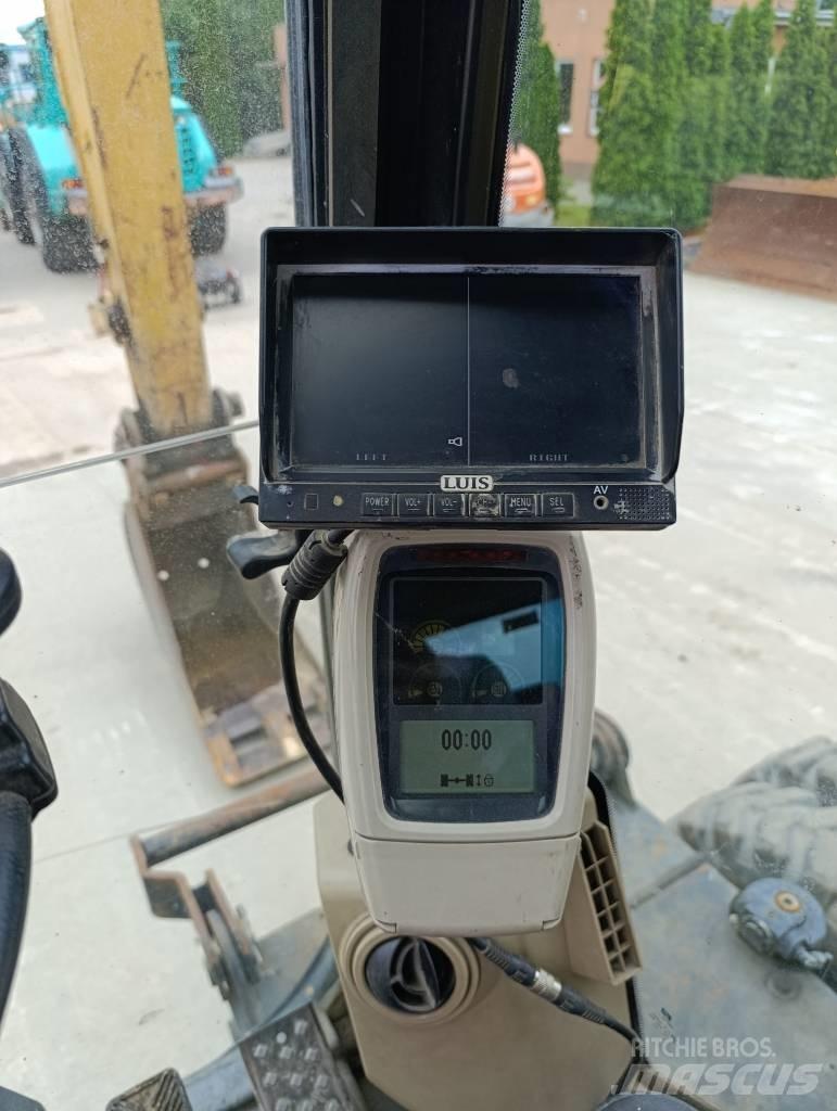 CAT M 316 C حفارات بعجل