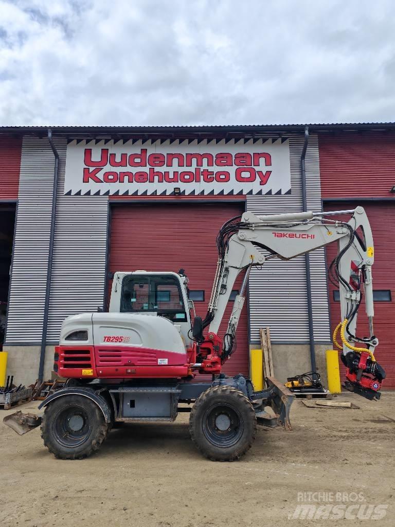 Takeuchi 295W حفارات بعجل