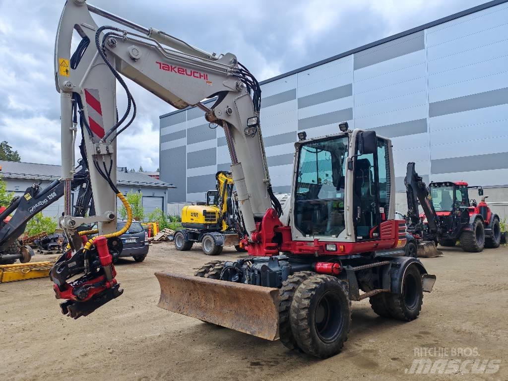 Takeuchi 295W حفارات بعجل