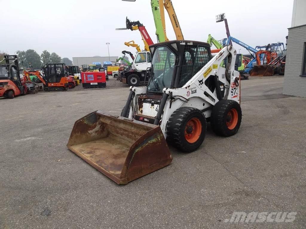 Bobcat 873 لوادر انزلاقية التوجيه