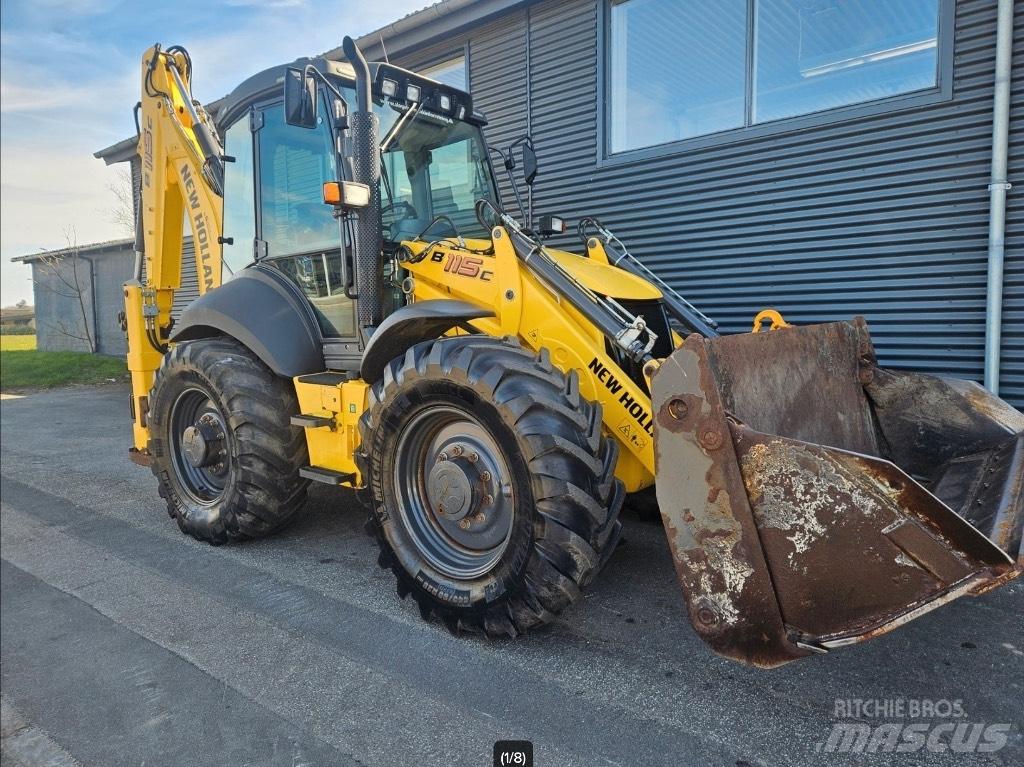 New Holland B 115 C لوادر ذات جرافات عكسية