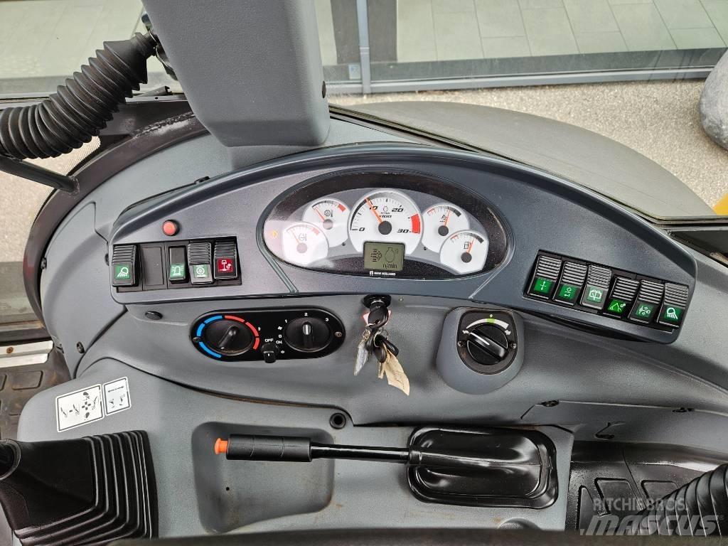 New Holland B 115 C لوادر ذات جرافات عكسية