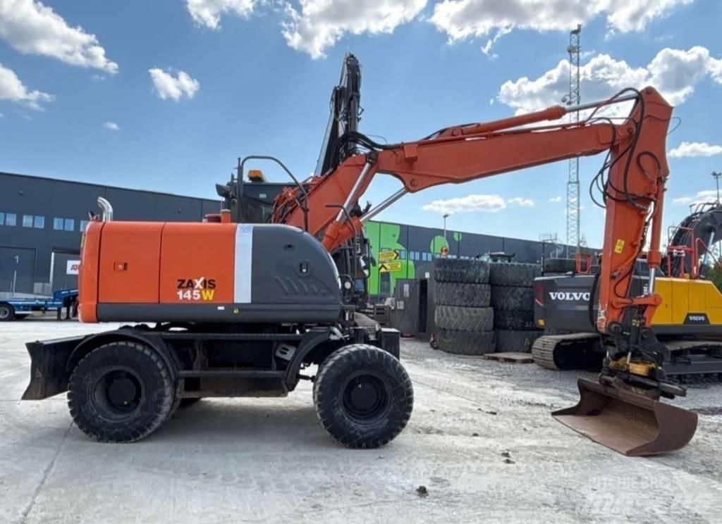 Hitachi ZX 145 W-3 حفارات بعجل