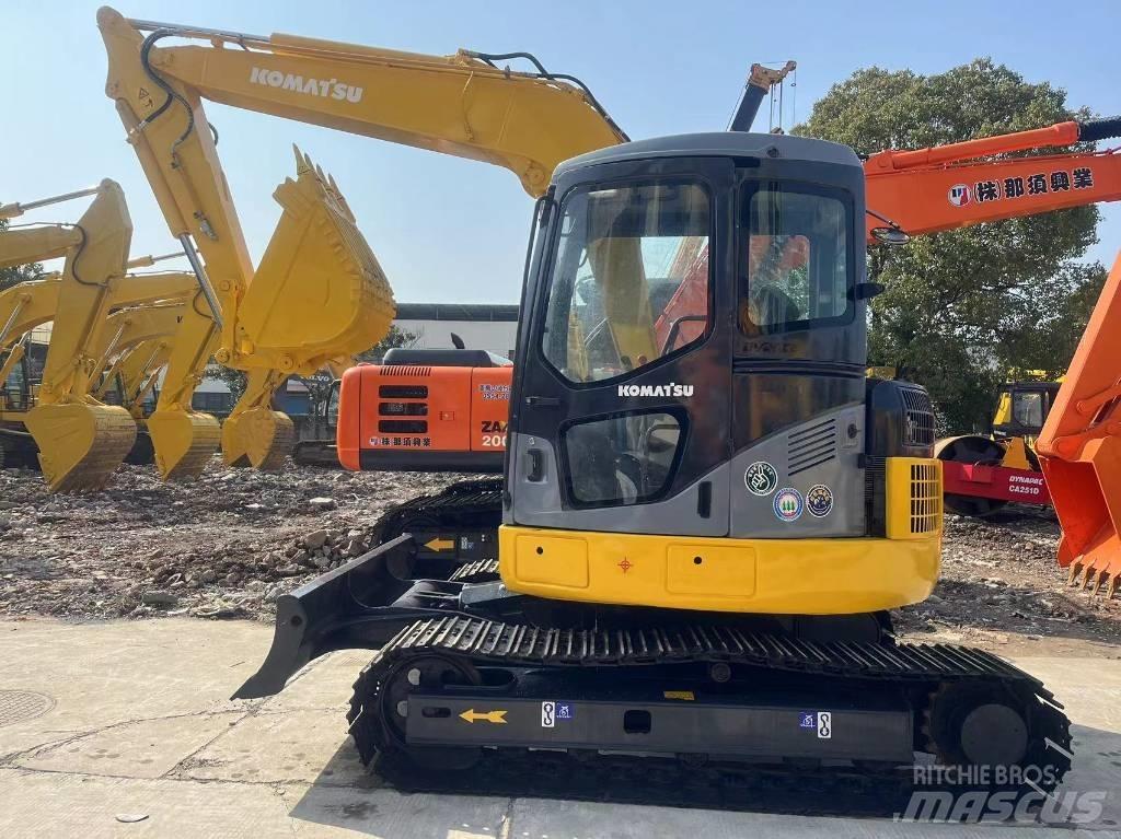 Komatsu pc78 حفارات زحافة