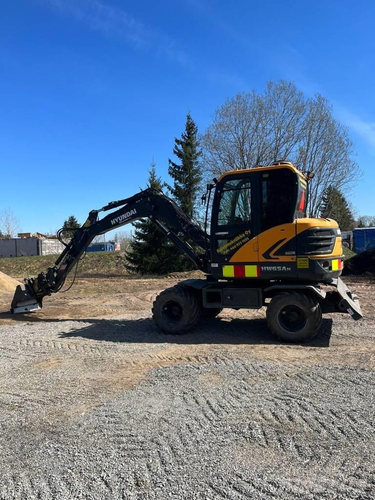Hyundai HW 65 A حفارات بعجل