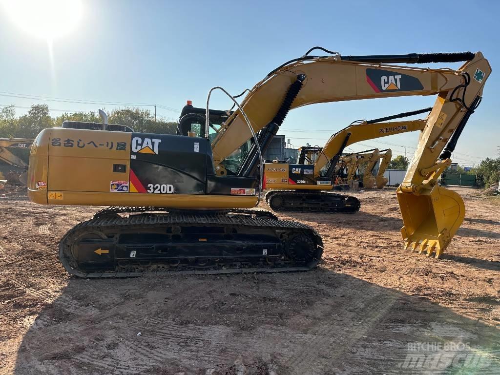 CAT 320 D L حفارات زحافة