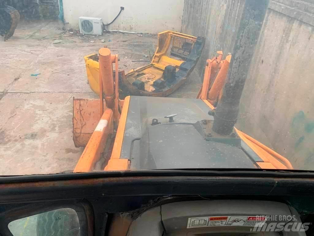 CASE 580 M لوادر ذات جرافات عكسية