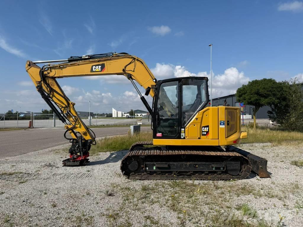 CAT 310 حفارات زحافة