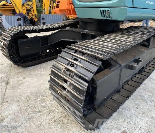 Hitachi EX120 حفارات زحافة