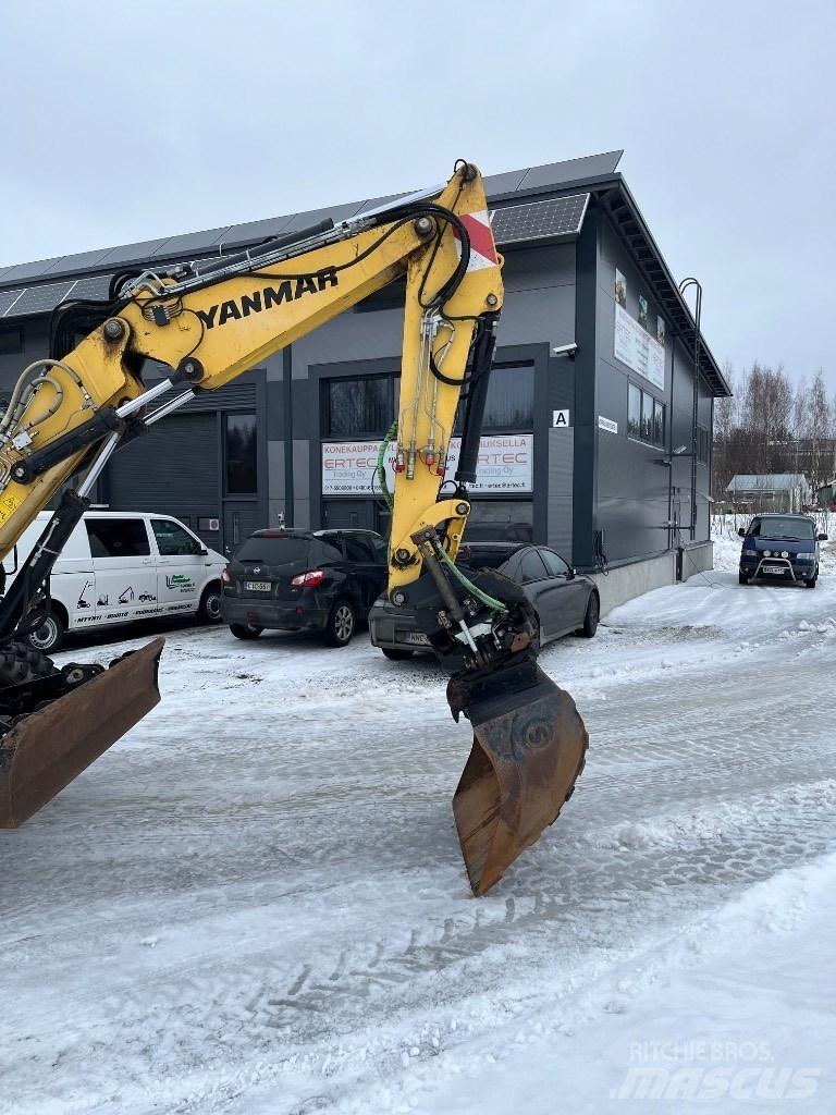 Yanmar B 95 W حفارات بعجل