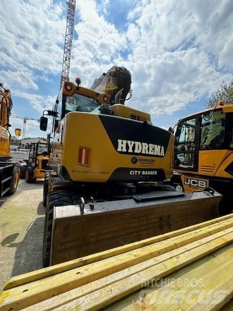 Hydrema MX18T4 حفارات بعجل