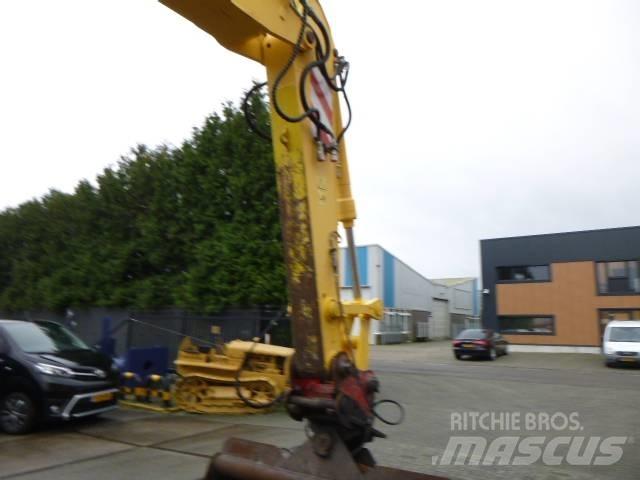 New Holland MH Plus حفارات بعجل