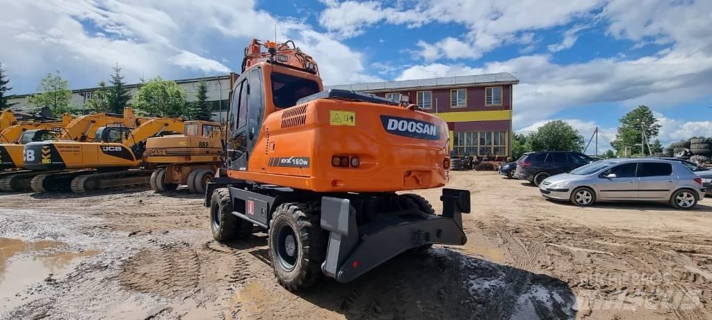Doosan DX 160 W حفارات بعجل
