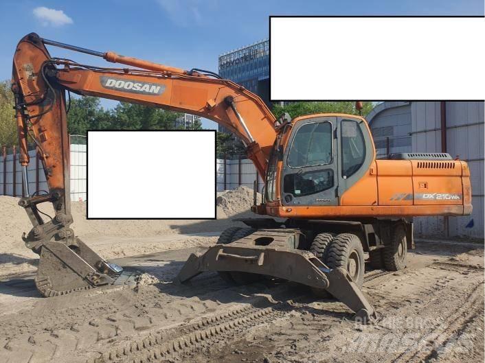 Doosan DX 210 WA حفارات بعجل