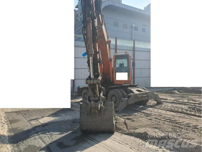 Doosan DX 210 WA حفارات بعجل