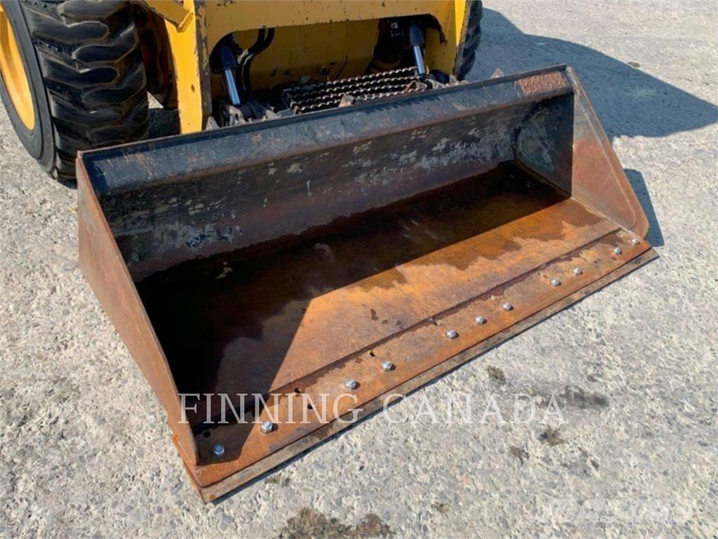 CAT 246D لوادر انزلاقية التوجيه