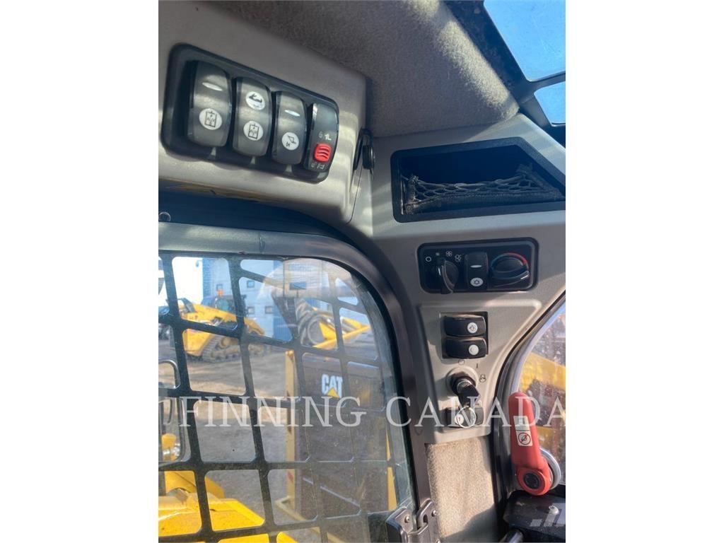 CAT 272D لوادر انزلاقية التوجيه