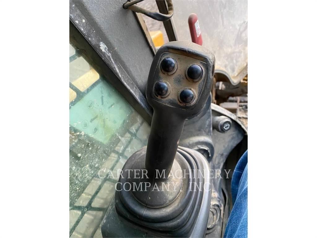 CAT 279D DCA2 لوادر انزلاقية التوجيه