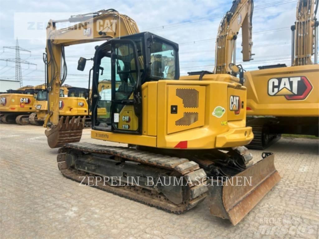 CAT 310 حفارات زحافة