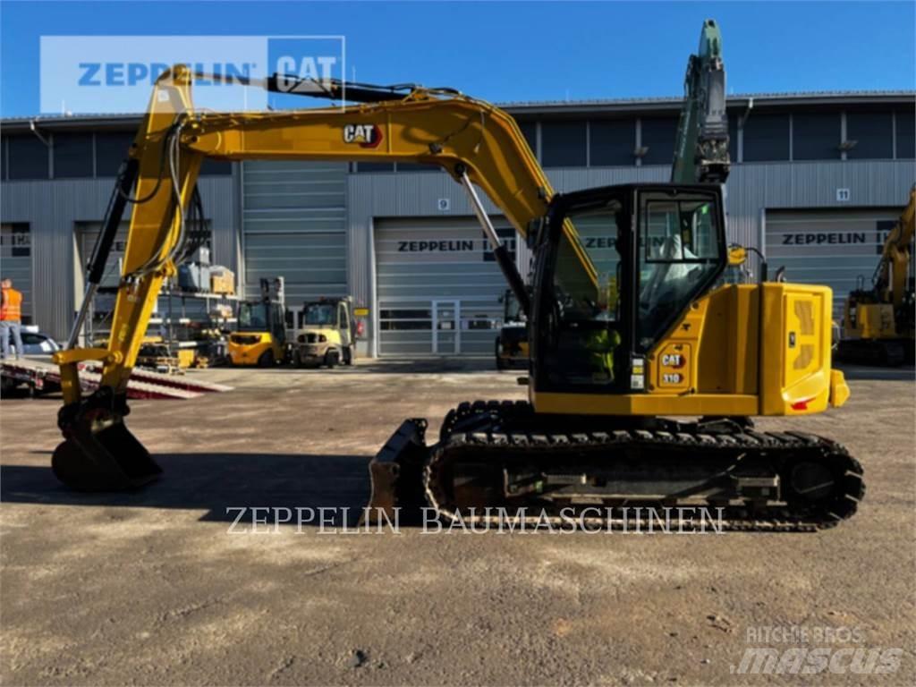 CAT 310 حفارات زحافة