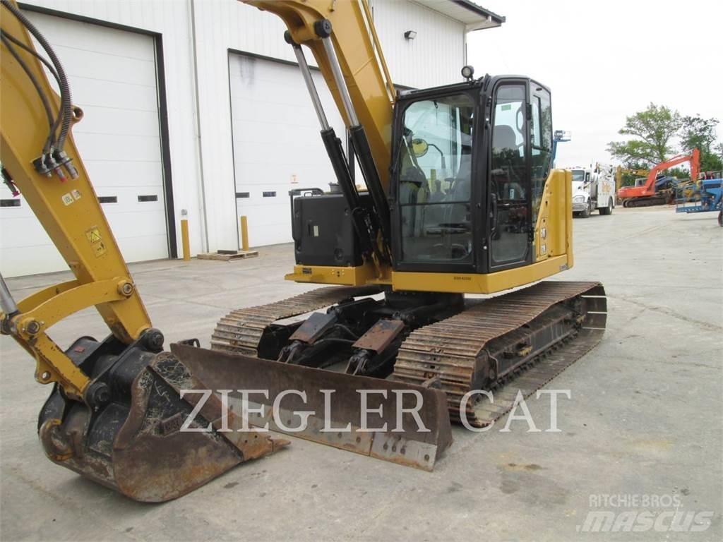 CAT 310 حفارات زحافة