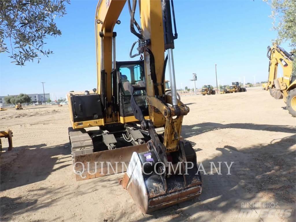 CAT 310 حفارات زحافة
