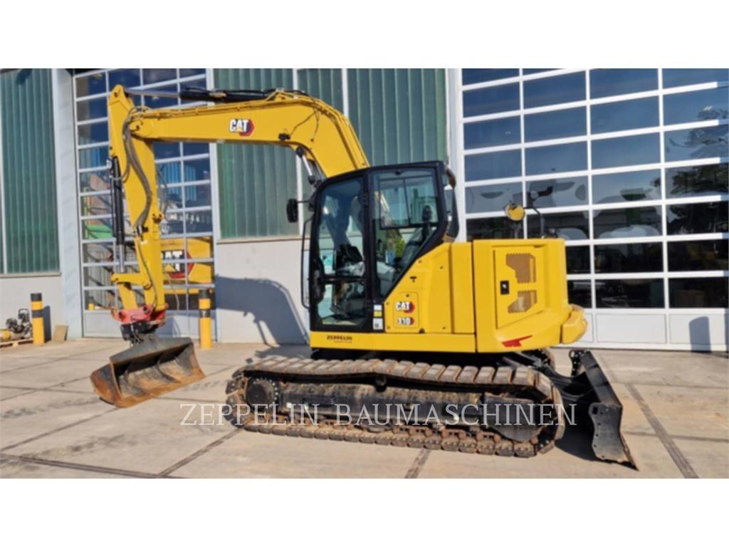 CAT 310 حفارات زحافة