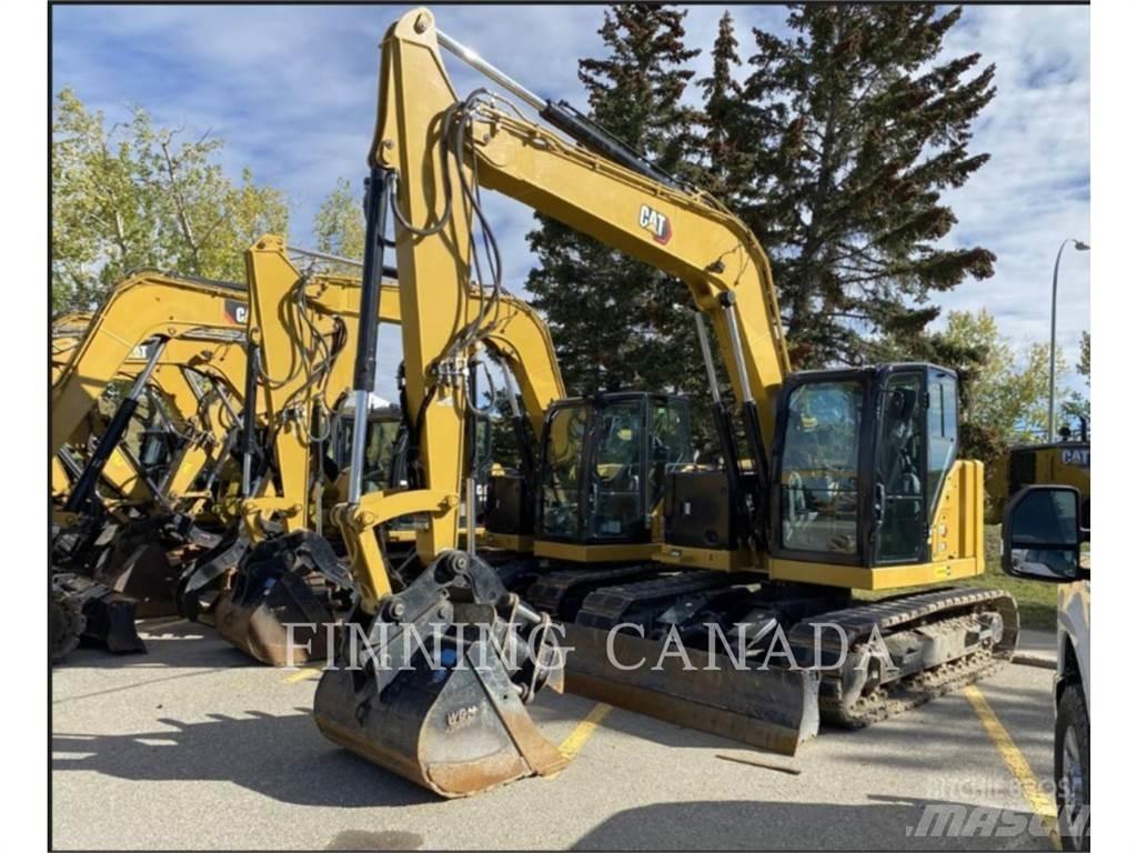 CAT 310-07 حفارات زحافة