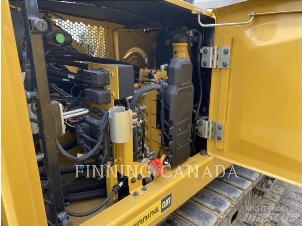 CAT 310-07 حفارات زحافة