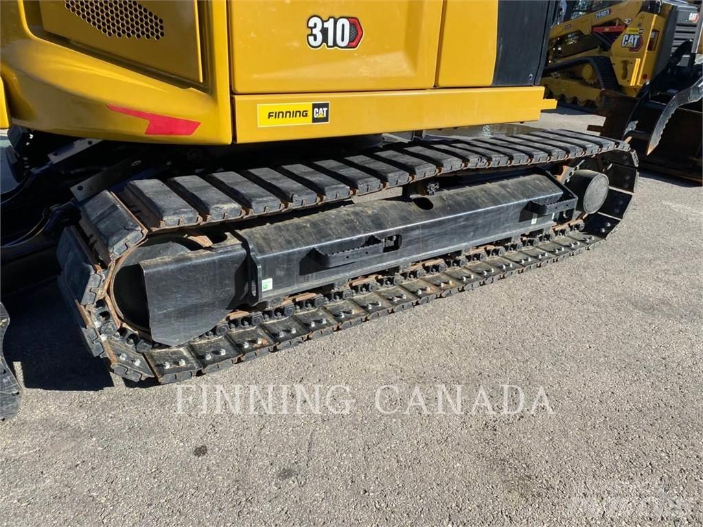 CAT 310-07 حفارات زحافة