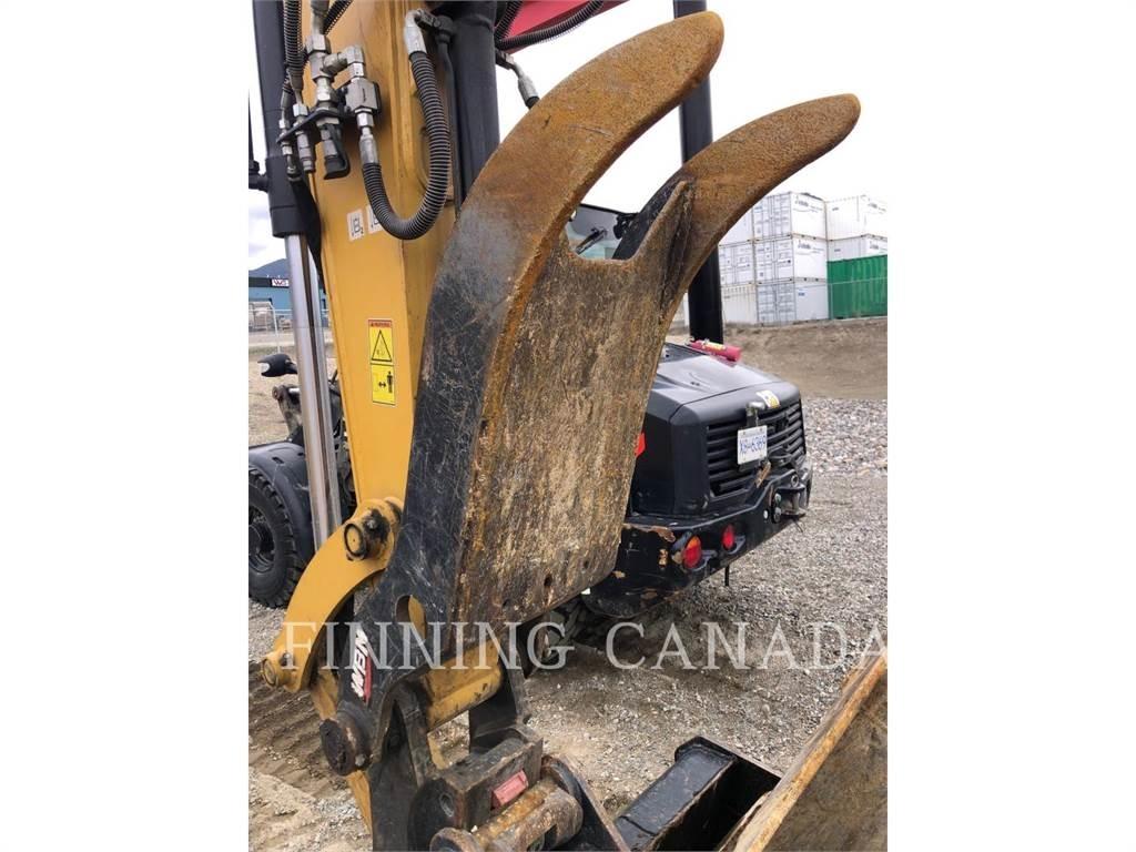 CAT 310-07 حفارات زحافة