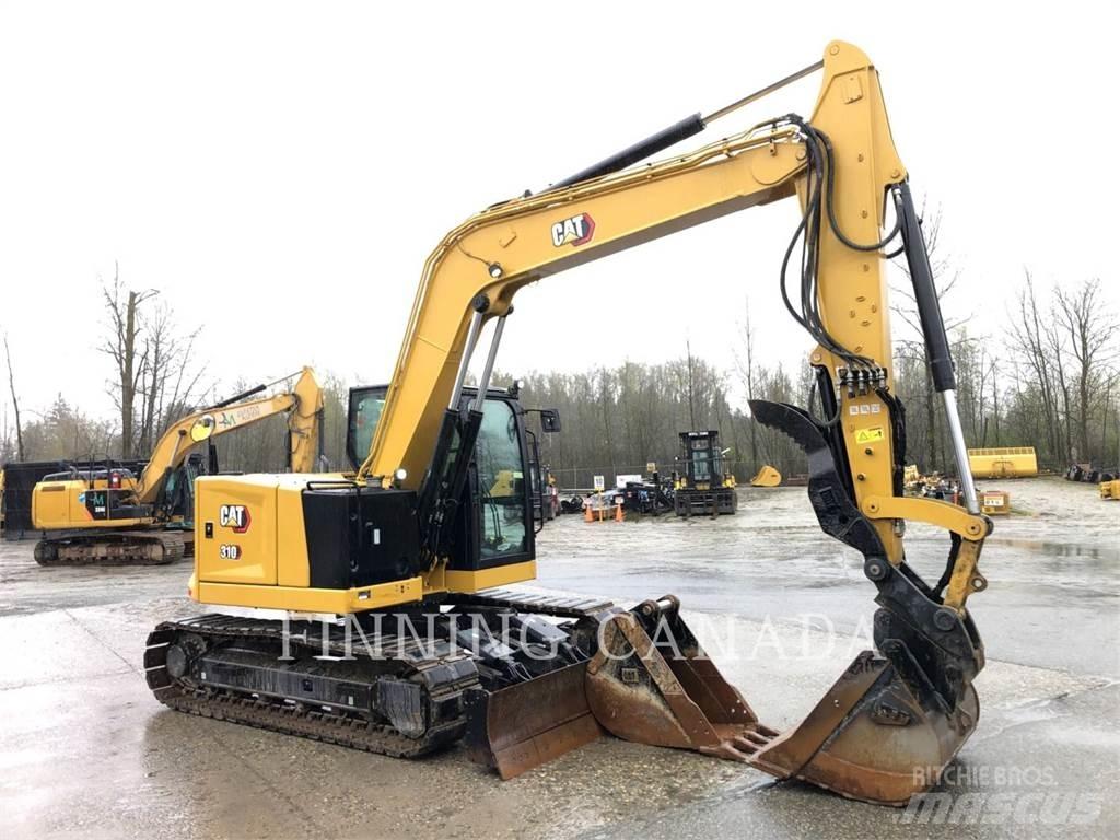 CAT 310-07 حفارات زحافة