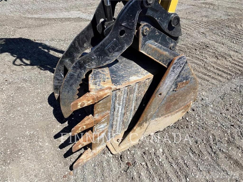 CAT 310-07 حفارات زحافة