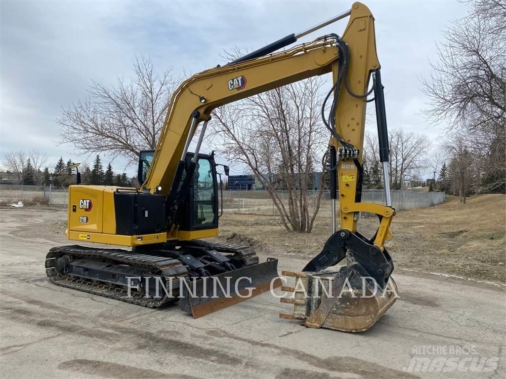 CAT 310-07 حفارات زحافة