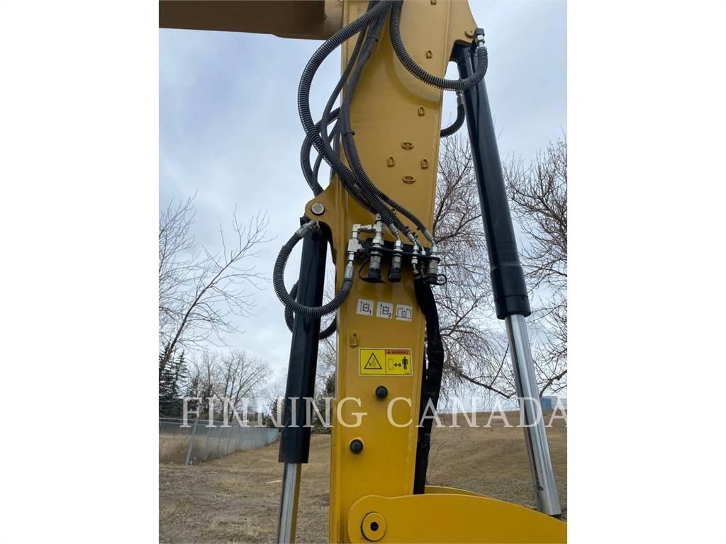 CAT 310-07 حفارات زحافة