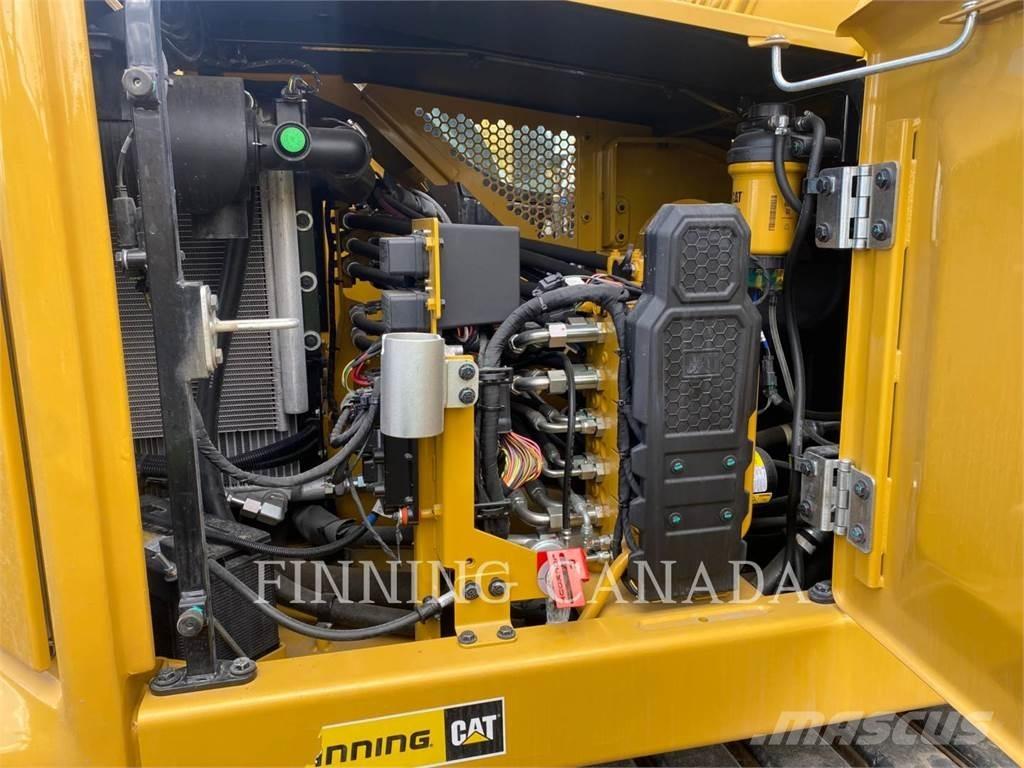 CAT 310-07 حفارات زحافة