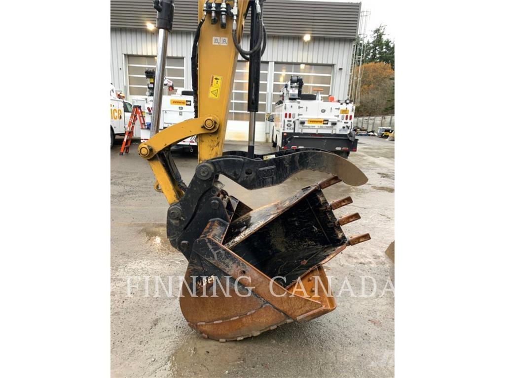 CAT 310-07 حفارات زحافة