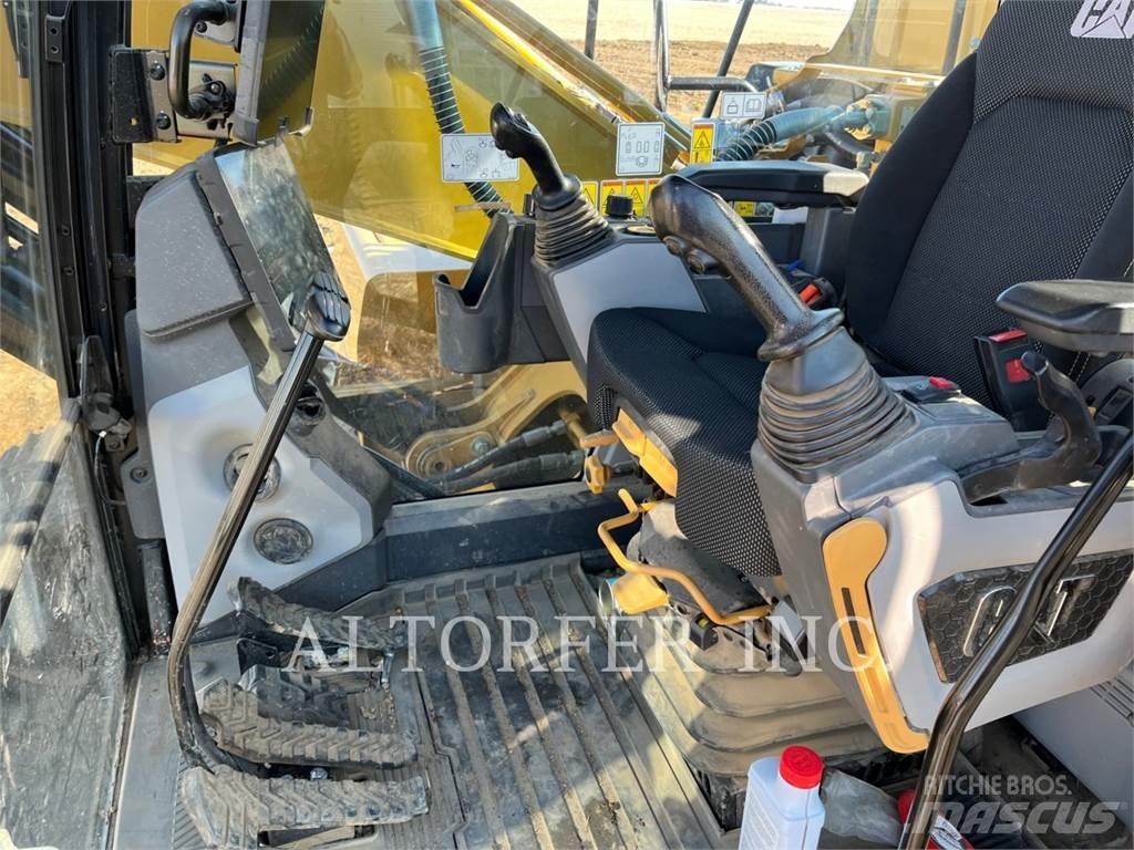 CAT 320-07 حفارات زحافة