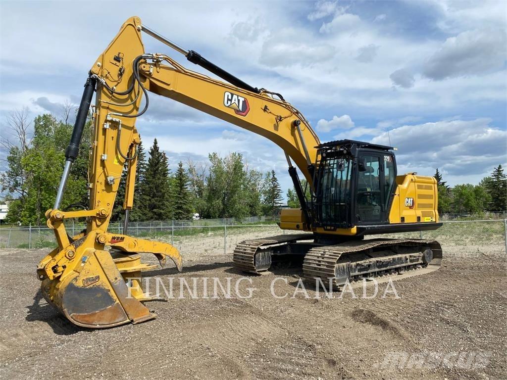 CAT 320-07 حفارات زحافة