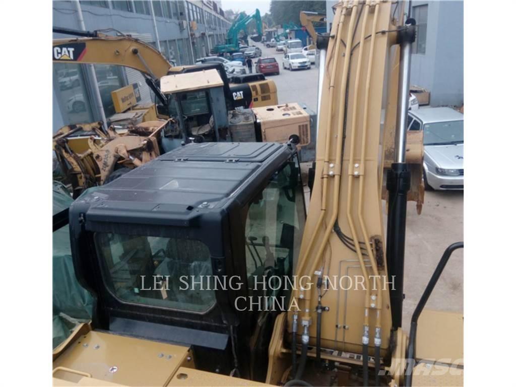 CAT 320-07 حفارات زحافة