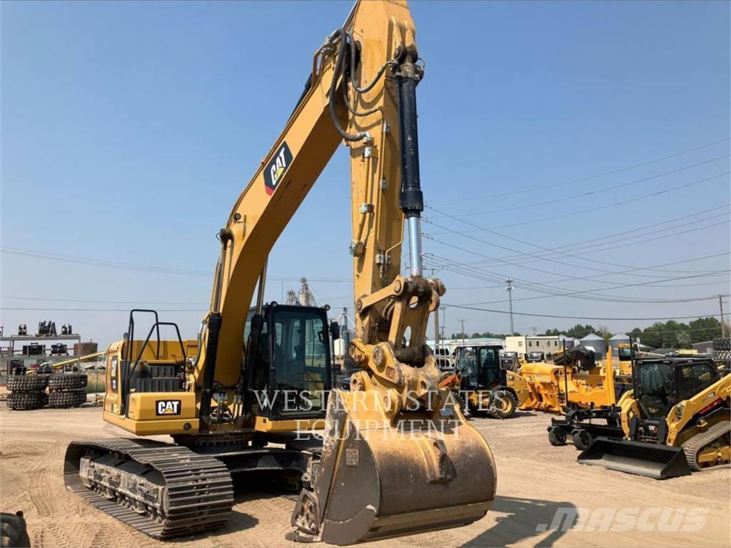 CAT 323 حفارات زحافة