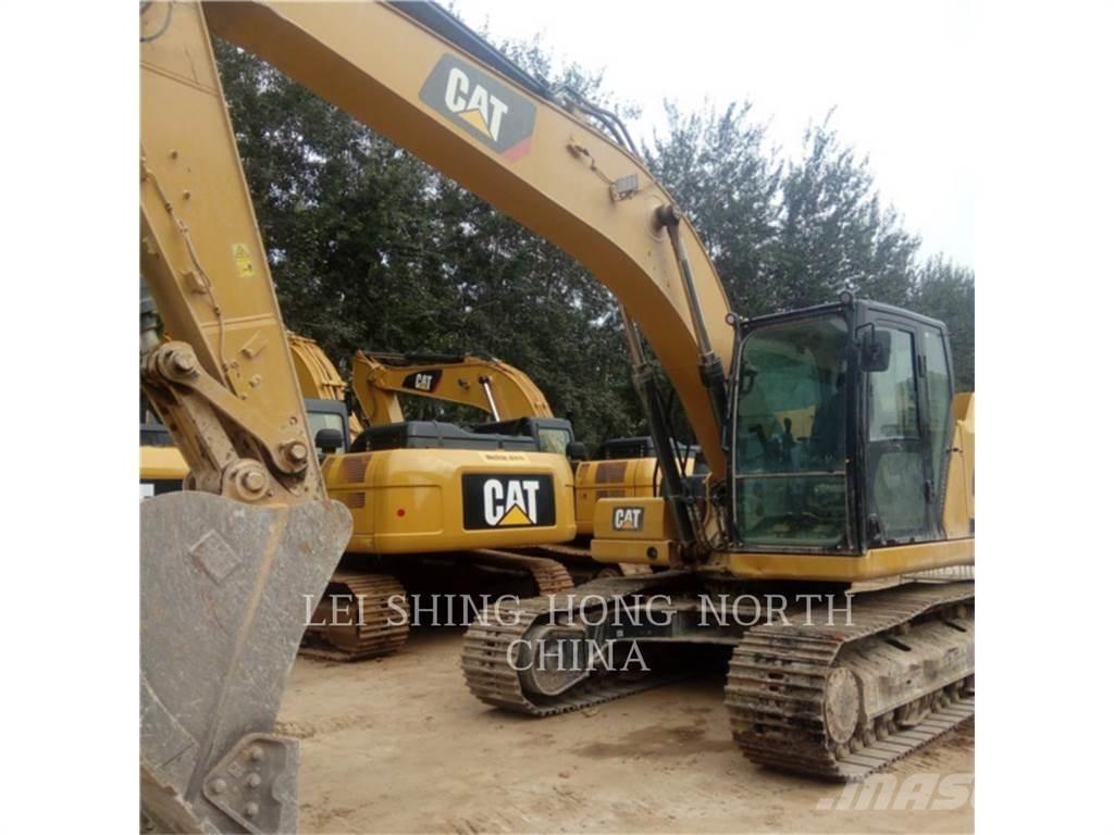CAT 323-07 حفارات زحافة