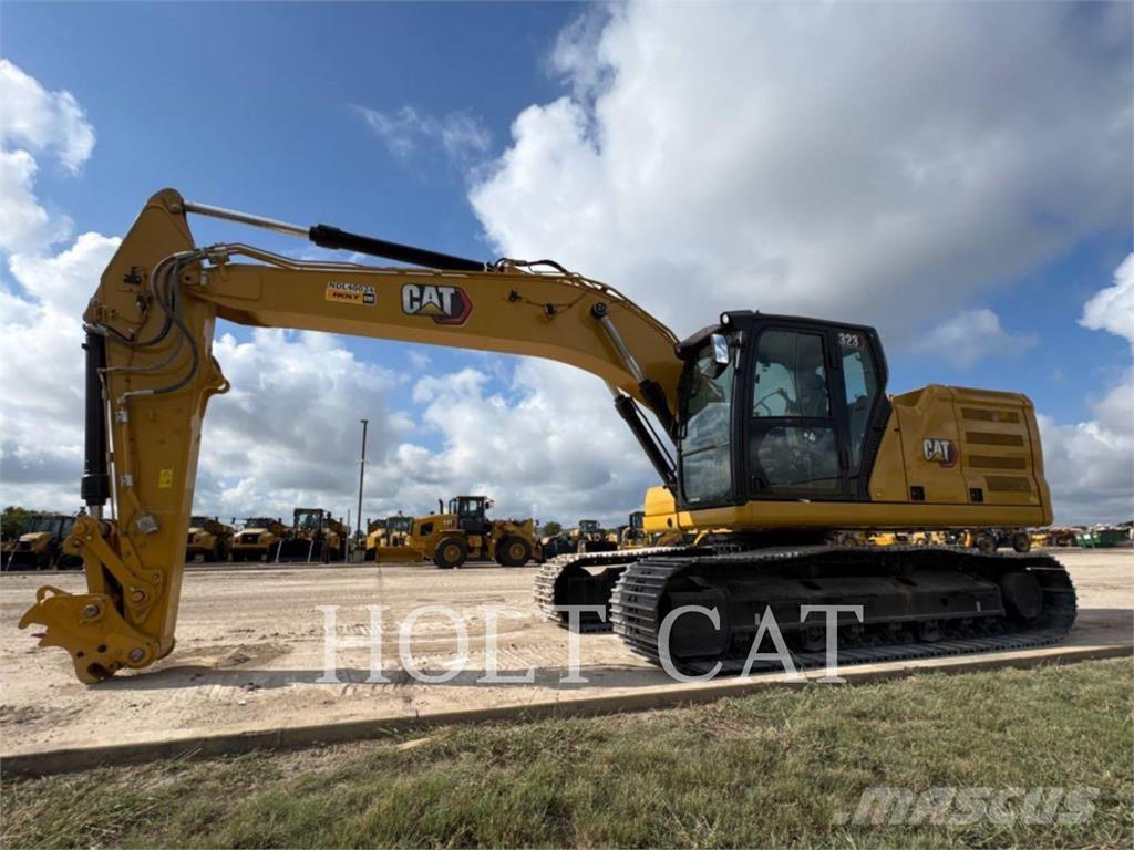 CAT 323 TC لوادر بعجل