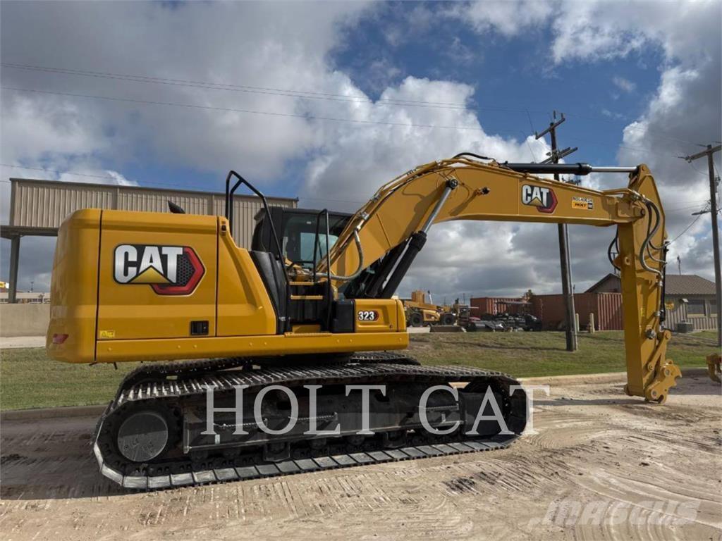 CAT 323 TC لوادر بعجل